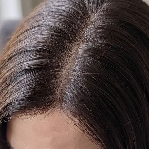 The same part after three applications, evenly dark brown with no line